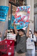 Protesters Rally At Tesla Dealership And March To Billionaires’ Offices In Manhattan