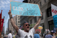 Protesters Rally At Tesla Dealership And March To Billionaires’ Offices In Manhattan