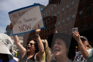 Protesters Rally At Tesla Dealership And March To Billionaires’ Offices In Manhattan