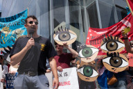 Protesters Rally At Tesla Dealership And March To Billionaires’ Offices In Manhattan