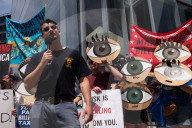 Protesters Rally At Tesla Dealership And March To Billionaires’ Offices In Manhattan