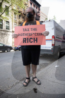 Protesters Rally At Tesla Dealership And March To Billionaires’ Offices In Manhattan