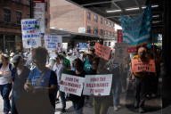 Protesters Rally At Tesla Dealership And March To Billionaires’ Offices In Manhattan