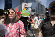 Protesters Rally At Tesla Dealership And March To Billionaires’ Offices In Manhattan