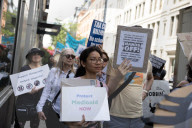 Protesters Rally At Tesla Dealership And March To Billionaires’ Offices In Manhattan