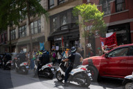 Protesters Rally At Tesla Dealership And March To Billionaires’ Offices In Manhattan