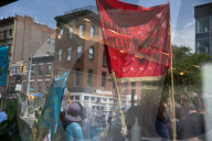 Protesters Rally At Tesla Dealership And March To Billionaires’ Offices In Manhattan