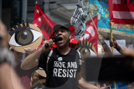 Protesters Rally At Tesla Dealership And March To Billionaires’ Offices In Manhattan