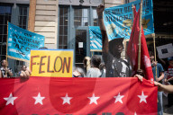 Protesters Rally At Tesla Dealership And March To Billionaires’ Offices In Manhattan