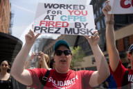 Protesters Rally At Tesla Dealership And March To Billionaires’ Offices In Manhattan