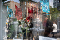 Protesters Rally At Tesla Dealership And March To Billionaires’ Offices In Manhattan