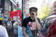Protesters Rally At Tesla Dealership And March To Billionaires’ Offices In Manhattan