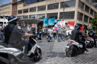 Protesters Rally At Tesla Dealership And March To Billionaires’ Offices In Manhattan
