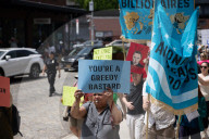 Protesters Rally At Tesla Dealership And March To Billionaires’ Offices In Manhattan