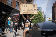 Protesters Rally At Tesla Dealership And March To Billionaires’ Offices In Manhattan