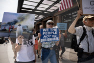 Protesters Rally At Tesla Dealership And March To Billionaires’ Offices In Manhattan