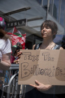 Protesters Rally At Tesla Dealership And March To Billionaires’ Offices In Manhattan