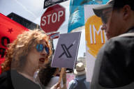 Protesters Rally At Tesla Dealership And March To Billionaires’ Offices In Manhattan