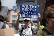 Protesters Rally At Tesla Dealership And March To Billionaires’ Offices In Manhattan