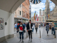 Tourists And Locals At Marienplatz In Front Of Munich’s New Town Hall