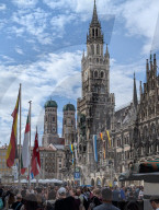 Tourists And Locals At Marienplatz In Front Of Munich’s New Town Hall