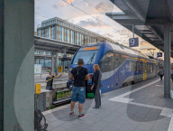 Windshield Of A BRB Regional Train To Salzburg Being Cleaned During Sunset At Munich Central Station