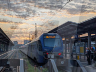 Windshield Of A BRB Regional Train To Salzburg Being Cleaned During Sunset At Munich Central Station