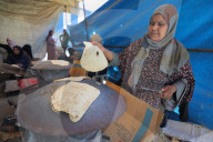 Gaza women bake bread in refugee camp