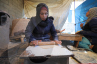 Gaza women bake bread in refugee camp