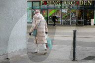 Senior Woman Shopping At Pasing Arcaden In Munich