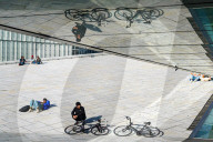Visitors Relax On The Roof Of The Oslo Opera House