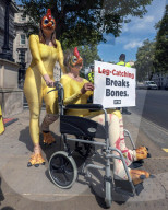 PETA Injured 'Chickens' Protest Whitehall in London, UK.