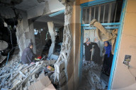 Israeli Strikes Kill 31 At Gaza Shelters For Displaced Palestinians