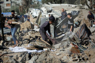 Israeli Strikes Kill 31 At Gaza Shelters For Displaced Palestinians
