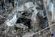 Israeli Strikes Kill 31 At Gaza Shelters For Displaced Palestinians