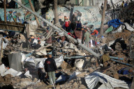 Israeli Strikes Kill 31 At Gaza Shelters For Displaced Palestinians