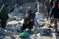 Israeli Strikes Kill 31 At Gaza Shelters For Displaced Palestinians