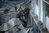 Israeli Strikes Kill 31 At Gaza Shelters For Displaced Palestinians