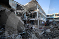 Israeli Strikes Kill 31 At Gaza Shelters For Displaced Palestinians