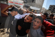 Palestinians Mourn Relatives Who Was Killed In An Israeli Airstrike In Gaza City