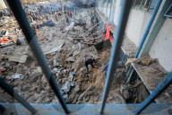 Israeli Strikes Kill 31 At Gaza Shelters For Displaced Palestinians