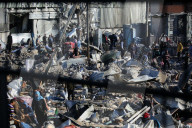 Israeli Strikes Kill 31 At Gaza Shelters For Displaced Palestinians