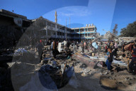 Israeli Strikes Kill 31 At Gaza Shelters For Displaced Palestinians