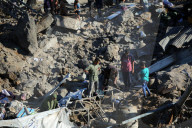 Israeli Strikes Kill 31 At Gaza Shelters For Displaced Palestinians
