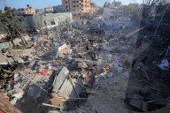 Israeli Strikes Kill 31 At Gaza Shelters For Displaced Palestinians