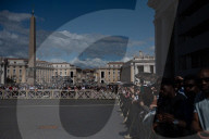 Faithful Wait At St Peter's Square As The Conclave To Elect A New Pope Starts In The Vatican