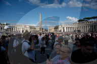 Faithful Wait At St Peter's Square As The Conclave To Elect A New Pope Starts In The Vatican