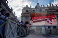 Faithful Wait At St Peter's Square As The Conclave To Elect A New Pope Starts In The Vatican