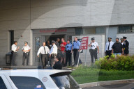 Philadelphia Police Officer Shot In Line Of Duty While Trying To Break Up A Fight Outside Overbrook High School