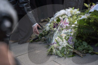 People Mourn The Death Of A Woman Who Was Murdered With An Axe On The Campus Of The University Of Warsaw 